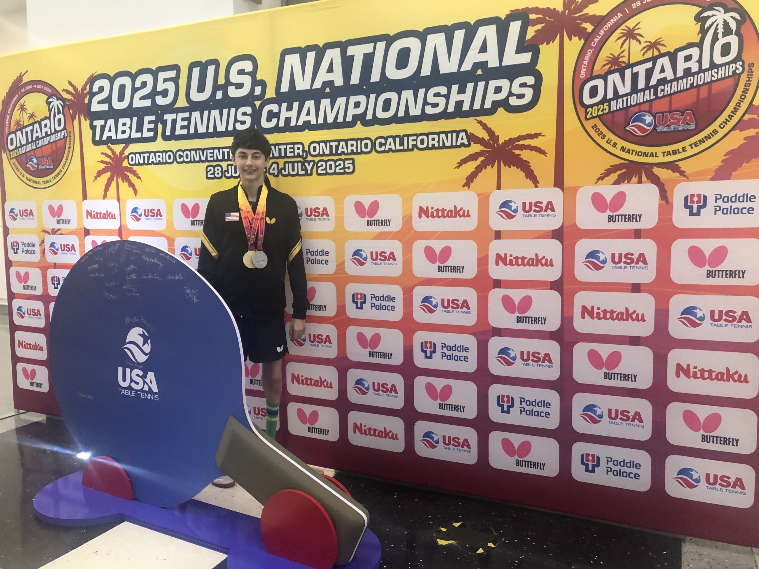 Cole Rothenberger wearing medals at the 2025 U.S. Nationals